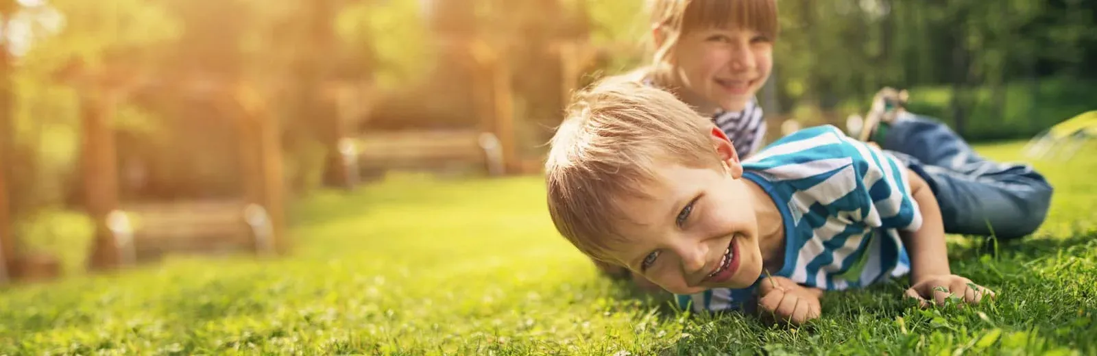 Kids playing in green lawn