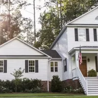 White house with a beautiful yard