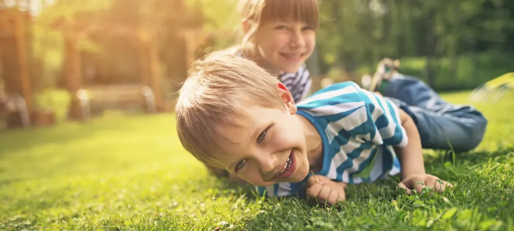 kid in lawn